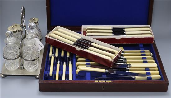A part canteen of bone handled knives, two sets of cased table knives, a cruet and sundry plated wares